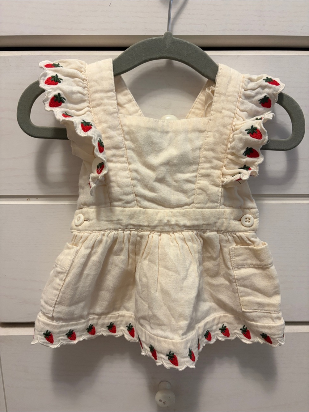 Hanna Andersson Cream Pinafore with Red Strawberry Detail